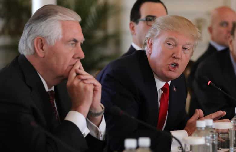 U.S. President Trump speaks next to Tillerson during bilateral meeting with China's President Xi at Trump's Mar-a-Lago estate in Palm Beach