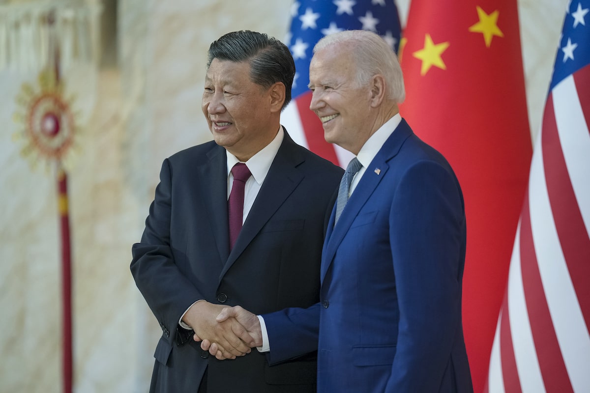 President Joe Biden greets and poses for a photo with Chinese President Xi Jingping ahead of their bilateral meeting, Monday, November 14, 2022, at the Mulia Resort in Bali, Indonesia. (Official White House Photo by Adam Schultz)More: Original public domain image from <a href="https://www.flickr.com/photos/whitehouse/52650920436/" target="_blank" rel="noopener noreferrer nofollow">Flickr</a>